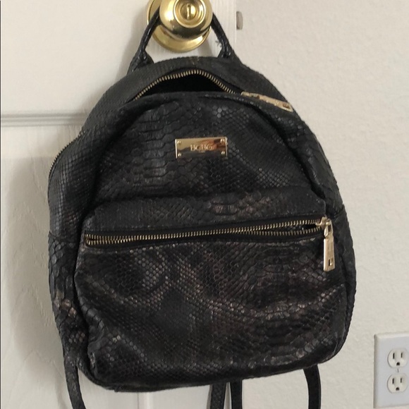BCBG Handbags - Gray and gold backpack BCBG MOVING MAKE AN OFFER